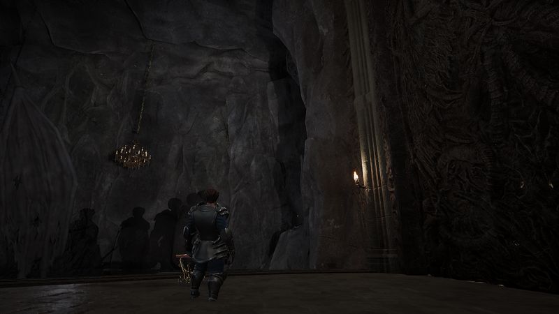 A lone knight in a dark cavern lit by a distant chandelier